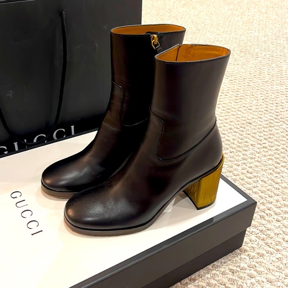 Gucci boots black color with golden heels. - Picture 1 of 6
